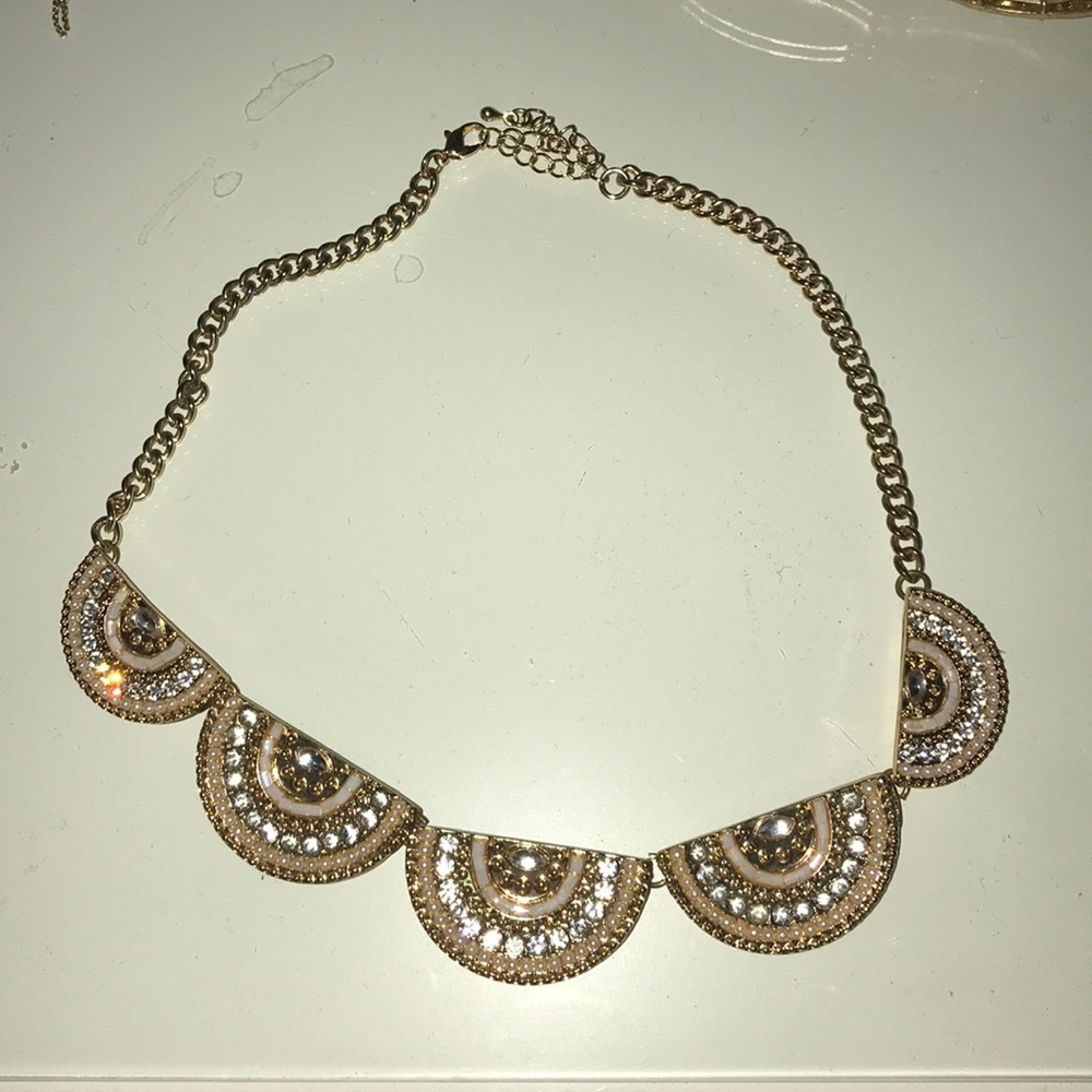 Gold and white necklace